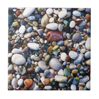 Pebble beach in Rhodes, Greece up close photo Ceramic Tile