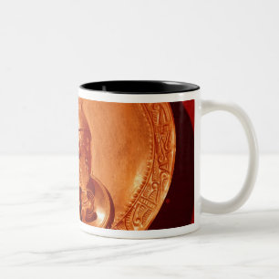Pectoral with a human face Two-Tone coffee mug