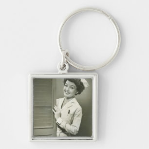 Peeping Nurse Key Ring