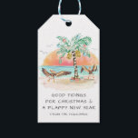 Pelican and Palm Tree Tropical Beach Christmas Gift Tags<br><div class="desc">Coastal Christmas gift tags feature two pelican sea birds flapping their wings in joy at seeing a palm tree Christmas tree and presents on the beach. Greeting says "Good Tidings For Christmas and a Flappy New Year". The greeting and name can be personalized. Happy Holidays! Art by KL Stock.</div>