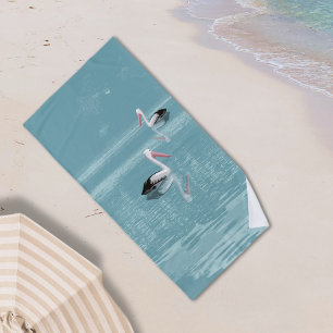 Pelican Couple Paddling on Calm Aqua Water Beach Towel