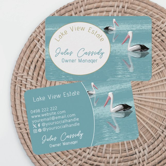 Pelican Couple Paddling on Calm Aqua Water Oval Business Card (Creator Uploaded)