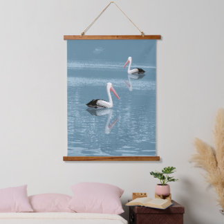 Pelican Couple Paddling on Calm Blue Water Hanging Tapestry