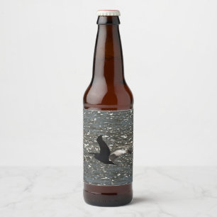 Pelican Flying Over Shimmering Lake Bafa Beer Bottle Label