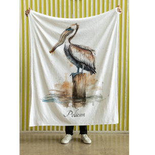 Pelican standing on a pole Fleece Blanket