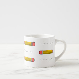 Pencil scrabble on white espresso cup