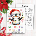 Penguin 2026 Calendar Merry and Bright Christmas Holiday Card<br><div class="desc">Create unique personalised non-photo Christmas cards with a cute penguin holding lights and wearing a Christmas hat. The cheerful penguin and a Merry & Bright greetings are on the front side. On the backside, there is a full year at a glance Sunday through Saturday 2026 calendar. Use the template to...</div>