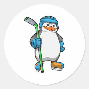 Penguin at Ice hockey with Ice hockey stick Classic Round Sticker