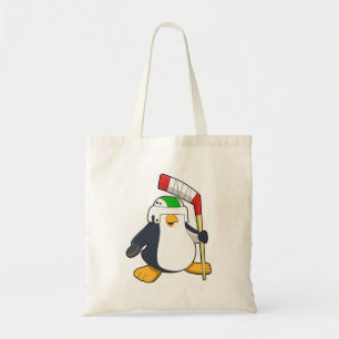 Penguin at Ice hockey with Ice hockey stick Tote Bag