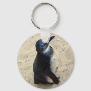 Penguin on sand key ring