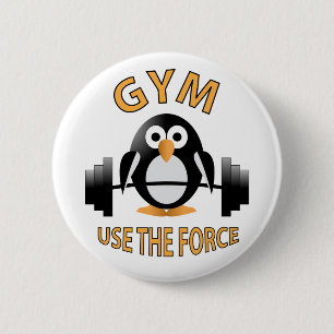 Penguin with a barbell 6 cm round badge