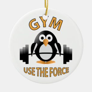 Penguin with a barbell ceramic ornament