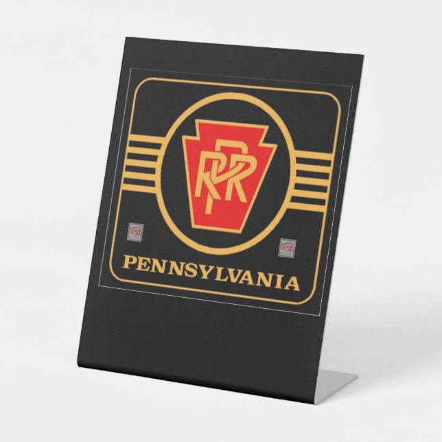 Pennsylvania railroad black and gold logo       pedestal sign (Front)