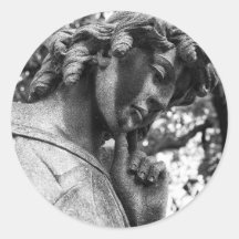 Pensive angel looking down