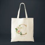Peony Floral Letter C Gold Monogram Bridesmaid Tote Bag<br><div class="desc">Floral letter C monogram tote bag features watercolor floral bouquet of white and blush pink peonies and roses, greenery accent and faux gold foil letter. This letter C floral bridesmaid monogram tote bag is perfect for weddings, showers, birthdays and so much more. Personalize by adding names or a short phrase....</div>