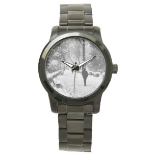 People at park in snowy winter day watch