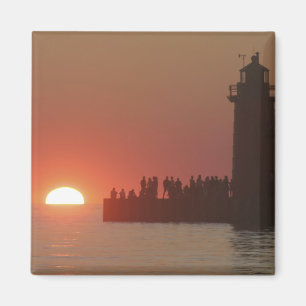 People lighthouse sunset silhouette at South Magnet
