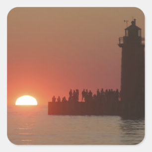 People lighthouse sunset silhouette at South Square Sticker