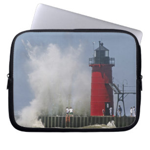 People on jetty watch large breaking waves in 2 laptop sleeve