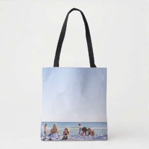 People on white sands by the beach tote bag