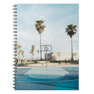 People outside outdoor basketball court notebook