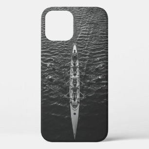 PEOPLE RIDING BOAT ON BODY OF WATER iPhone 12 CASE