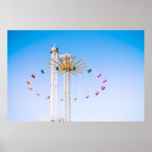 People riding swing amusement ride low-angle photo poster