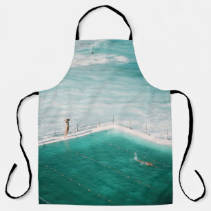 People standing and swimming on swimming pool besi apron