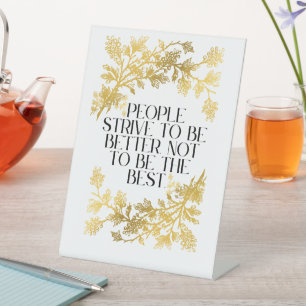 People strive to be better, not to be the best. pedestal sign