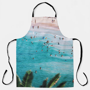 People swimming in the beach apron