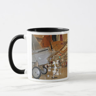 People touring National Museum of Naval Aviation Mug