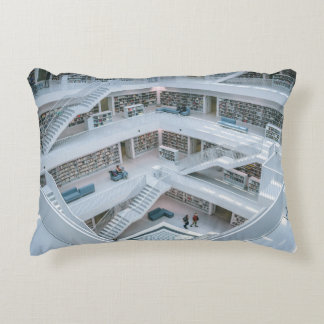 PEOPLE WALKING INSIDE LIBRARY DECORATIVE CUSHION