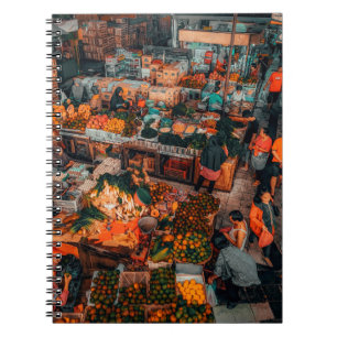 PEOPLE WALKING ON MARKET DURING DAYTIME NOTEBOOK