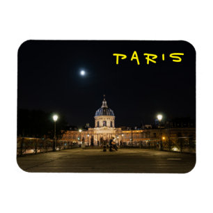 People walking on Pont des Arts at nigth - Paris Magnet