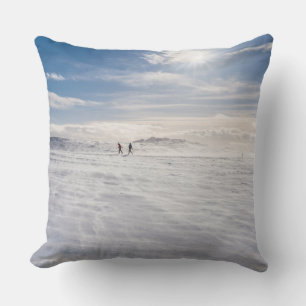 People walking over snow, Iceland Cushion