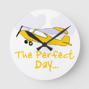 Perfect day flying aeroplane round clock