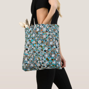 Perforated bluish piece over whitish texture  tote bag