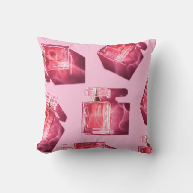Perfume bottles, pink background, flatlay cushion (Front)