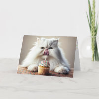 Persian Cat Licking a Birthday Cupcake