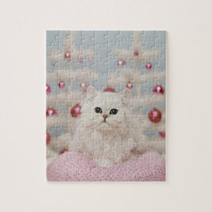 Persian cat sitting on pink pillow jigsaw puzzle