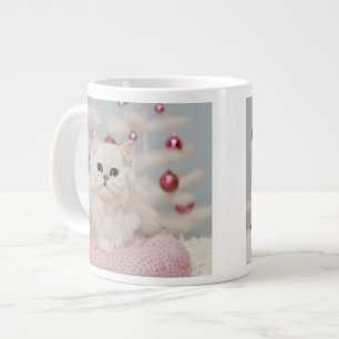 Persian cat sitting on pink pillow large coffee mug