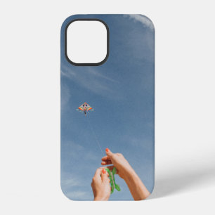 Person flying kite in the morning iPhone 12 case
