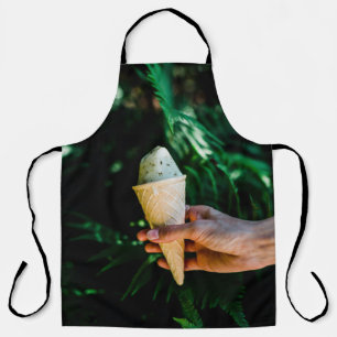 Person holding ice cream apron