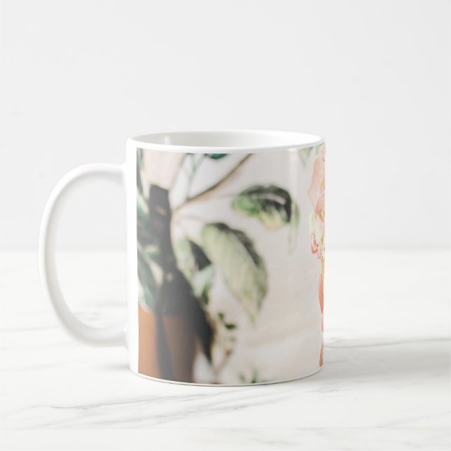 Person holding ice cream cone with three flavours  coffee mug (Left)