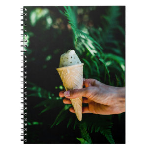 Person holding ice cream notebook