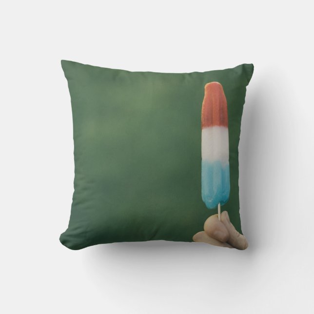 Person holding ice pop cushion (Front)