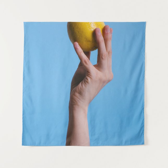 Person holding lemon tapestry (Front)