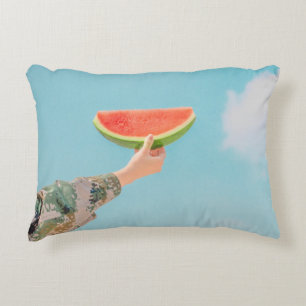 Person holding sliced watermelon decorative cushion