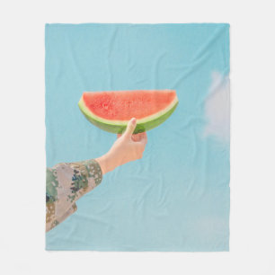 Person holding sliced watermelon fleece blanket