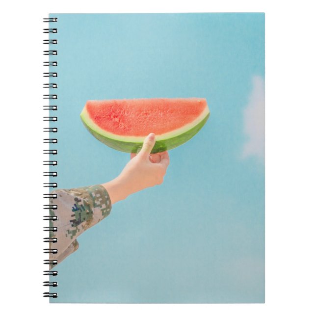 Person holding sliced watermelon notebook (Front)